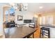 Kitchen with breakfast nook, granite counters, and view into the Gathering room at 4901 S Wadsworth Blvd # 17, Denver, CO 80123