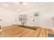 Entryway with hardwood floors and built-in bench seating at 931 S York St, Denver, CO 80209