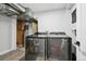 Basement laundry room with washer and dryer at 3661 Miller St, Wheat Ridge, CO 80033