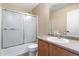 Simple bathroom with shower/tub combo and updated vanity at 5555 Perth Ct, Denver, CO 80249