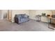 Bright home office with a desk, couch, and ample space at 5555 Perth Ct, Denver, CO 80249