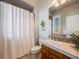 Clean bathroom with shower/tub combo and updated vanity at 8200 Harbortown Pl, Lone Tree, CO 80124