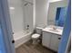 Bathroom with tub, shower, and a vanity with double sinks at 22861 E Stanford Ln # A, Aurora, CO 80015