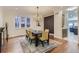 Formal dining room features hardwood floors and an accent wall at 500 Jackson St, Denver, CO 80206