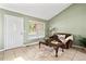 Cozy living room with a comfy couch and large window at 4153 S Dunkirk Way, Aurora, CO 80013