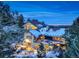 Luxury mountain home with expansive decks and stunning city views at 5237 Bear Mountain Dr, Evergreen, CO 80439