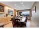 Bright dining room with large windows and mountain views at 5237 Bear Mountain Dr, Evergreen, CO 80439
