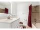 Bathroom with white vanity and burgundy accents at 12660 E Alaska Pl, Aurora, CO 80012