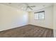 Spacious bedroom with ceiling fan and carpeting at 1745 W 102Nd Ave, Thornton, CO 80260