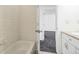 Bathroom with tub and access to bedroom at 1745 W 102Nd Ave, Thornton, CO 80260