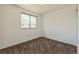 Well-lit bedroom featuring neutral wall paint and carpet at 1745 W 102Nd Ave, Thornton, CO 80260
