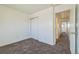 Spacious bedroom with double closets and hallway access at 1745 W 102Nd Ave, Thornton, CO 80260
