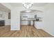 Modern kitchen with white cabinets, stainless steel appliances, and light brown countertops at 1745 W 102Nd Ave, Thornton, CO 80260