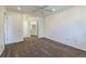 Bright bedroom with ceiling fan and mirrored closet doors at 1745 W 102Nd Ave, Thornton, CO 80260