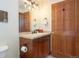 Clean bathroom with a pedestal sink and shower/tub combo at 34 Highfield Trail # 100, Breckenridge, CO 80424