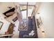 Overhead view of living room with sectional sofa and fireplace at 34 Highfield Trail # 100, Breckenridge, CO 80424