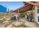 Covered patio area with table and chairs at 3906 S Pitkin Way, Aurora, CO 80013