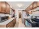 Well-equipped kitchen boasting ample counter space and cabinets at 3906 S Pitkin Way, Aurora, CO 80013