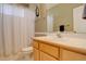 Clean bathroom with shower/tub combo and light wood vanity at 1065 Independence Dr, Larkspur, CO 80118
