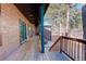 Spacious wooden deck with stairs leading to the backyard at 1065 Independence Dr, Larkspur, CO 80118