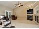 Spacious living room with fireplace and high ceilings at 1065 Independence Dr, Larkspur, CO 80118