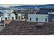 Partial view of homes and mountain backdrop at 9656 Browns Peak Cir, Littleton, CO 80125