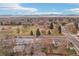 Aerial view showing home near park and mountains at 5948 Routt St, Arvada, CO 80004