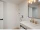 Simple bathroom with a single vanity and light wood flooring at 9725 E Harvard Ave # 336, Denver, CO 80231