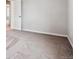 Empty bedroom with neutral walls and carpeting at 3453 N Irvington St, Aurora, CO 80019