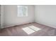 Unfurnished bedroom with plush carpet and natural light at 3453 N Irvington St, Aurora, CO 80019