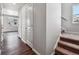 View of the stairway and a hallway with wooden-style flooring at 3453 N Irvington St, Aurora, CO 80019