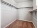 Ample storage space in the walk-in closet with built-in shelving at 3453 N Irvington St, Aurora, CO 80019