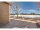 Brick patio with backyard access and open space views at 6327 S Miller Ct, Littleton, CO 80127