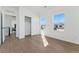Spacious bedroom with hardwood floors and large windows at 959 Eldorado Ln, Louisville, CO 80027