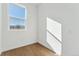 Spacious bedroom with large window and hardwood floors at 959 Eldorado Ln, Louisville, CO 80027