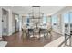 Modern kitchen with white cabinetry, quartz countertops, and a large island at 959 Eldorado Ln, Louisville, CO 80027