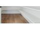 Bright walk-in pantry with ample shelving and wood flooring at 959 Eldorado Ln, Louisville, CO 80027