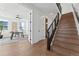 Modern staircase with metal railing and hardwood treads at 959 Eldorado Ln, Louisville, CO 80027