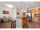 Modern kitchen with stainless steel appliances and granite countertops at 13456 Via Varra # 233, Broomfield, CO 80020