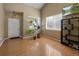 Light and airy entryway with hardwood floors and plenty of natural light at 33 Gaviota Ave, Brighton, CO 80601