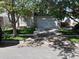 Two-story house with attached garage and well-maintained lawn at 33 Gaviota Ave, Brighton, CO 80601