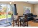 Bright dining area with sliding glass doors to backyard at 33 Gaviota Ave, Brighton, CO 80601
