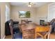 Cozy living room featuring a fireplace and built-in shelving at 33 Gaviota Ave, Brighton, CO 80601