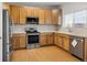 Well-equipped kitchen offering ample cabinet space at 33 Gaviota Ave, Brighton, CO 80601