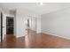 Well-lit bedroom with mirrored closet doors and in-unit laundry at 9901 E Evans Ave # 18D, Aurora, CO 80247