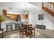 Kitchen with breakfast bar and stainless steel appliances at 23602 Pondview Pl, Golden, CO 80401