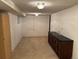 Finished basement recreation area with wet bar at 6300 W Mansfield Ave # 64, Denver, CO 80235