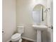 Clean powder room with pedestal sink and modern fixtures at 461 Interlocken Blvd # 105, Broomfield, CO 80021