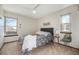 Bright bedroom with a queen-size bed and neutral decor at 11401 Red Cloud Peak, Littleton, CO 80127