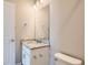 Clean bathroom with granite countertop, single sink, and mirror at 2549 Lupton Ln, Lafayette, CO 80026